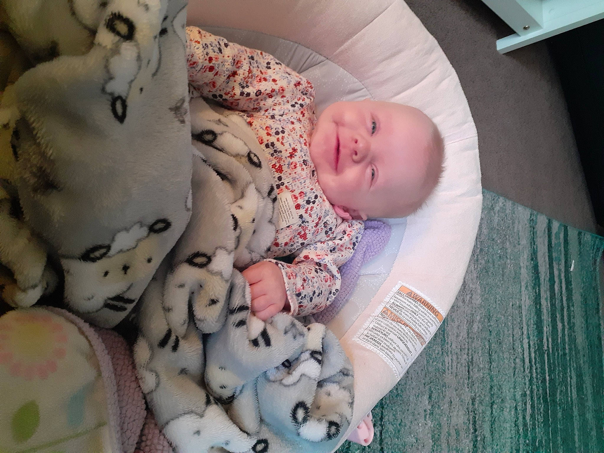 Senja joined the competition — help win amazing prizes! arm, baby, baby_products, baby_safety, baby_sleeping, baby_toddler_clothing, beauty, bed, bedding, bedtime, cheek, child, comfort, linens, pattern, person, pink, skin, sleeve, textile