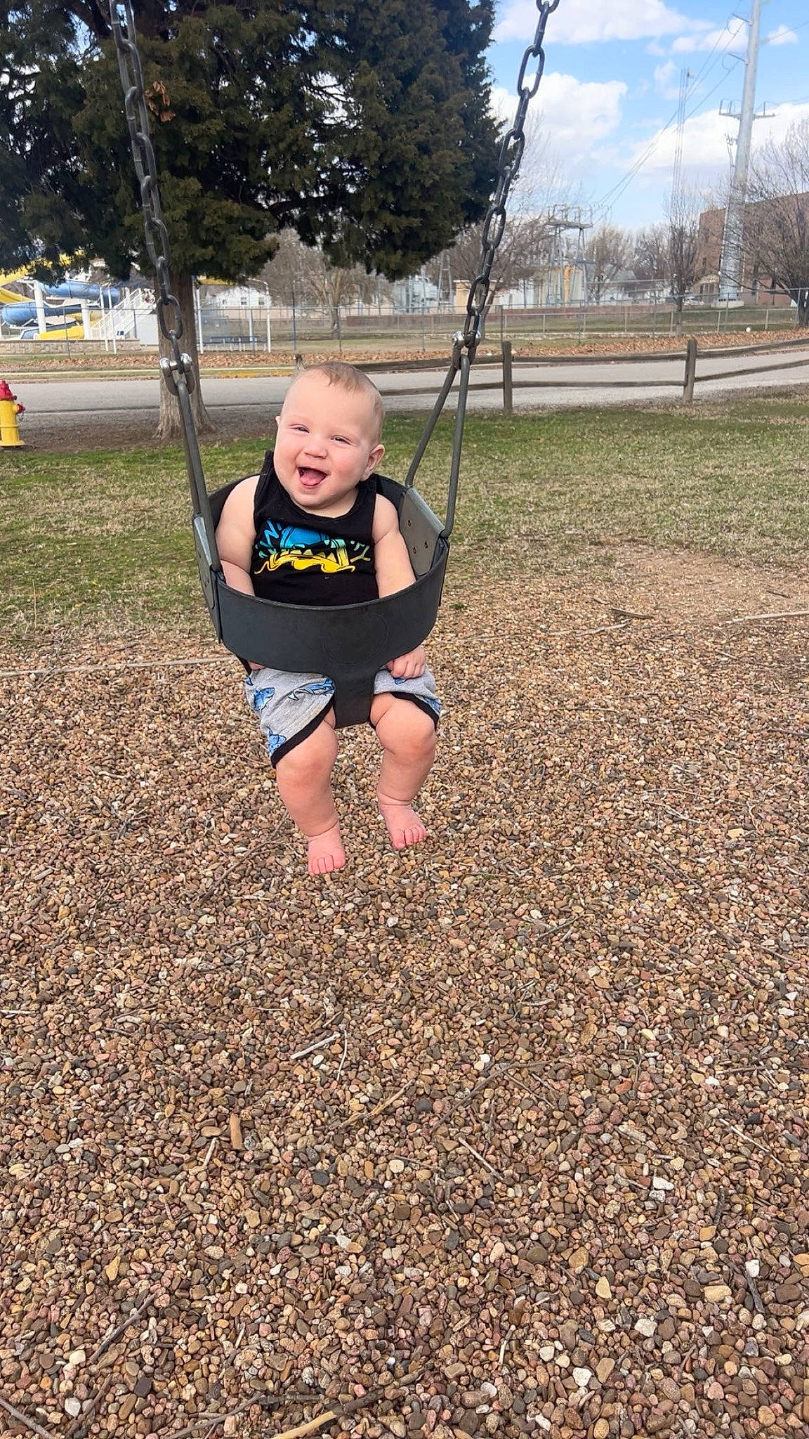 Slayter Ray joined the competition — help win amazing prizes! city, cloud, competition_event, fun, grass, happy, joy, leisure, outdoor_play_equipment, people_in_nature, person, plant, playground, recreation, shorts, sky, sleeve, soil, swing, t_shirt