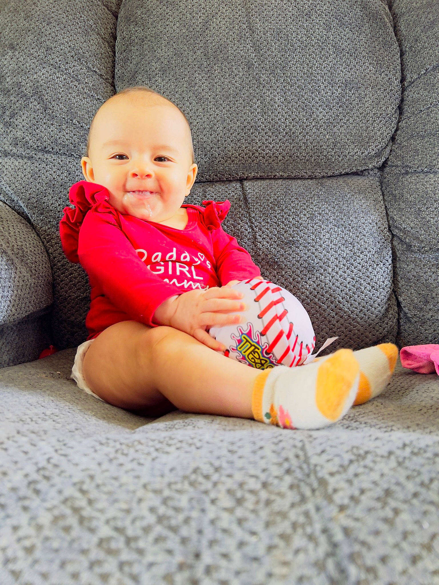 Laura joined the competition — help win amazing prizes! baby, baby_toddler_clothing, child, comfort, elbow, finger, flooring, foot, happy, human_body, human_leg, joy, knee, lap, leg, person, skin, smile, sock, textile