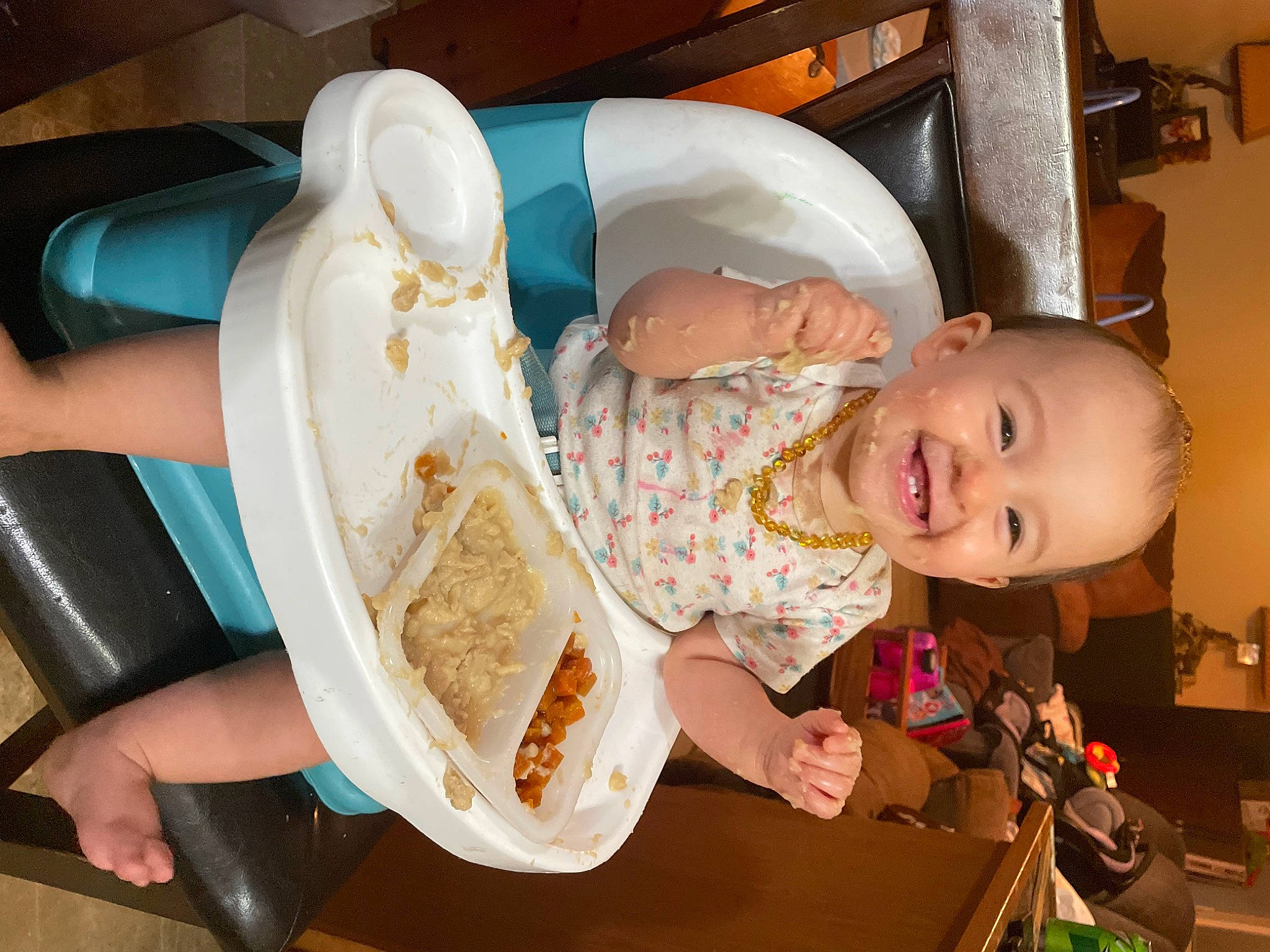 Laura joined the competition — help win amazing prizes! baby, baby_products, baby_toddler_clothing, chair, child, comfort, food, fun, happy, human_leg, joy, leisure, person, product, room, sitting, skin, smile, tableware, thigh