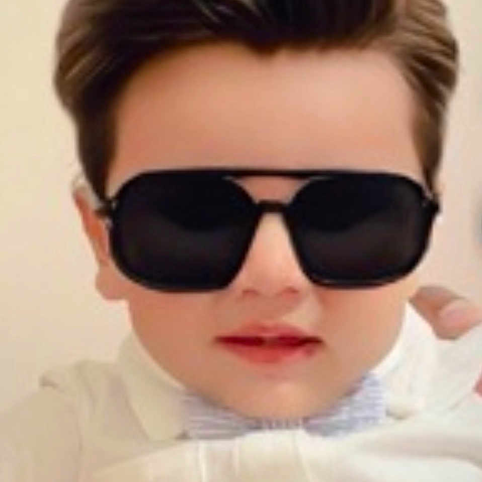Fariz joined the competition — help win amazing prizes! bow_tie, boy, casual, child, childhood, closeup, cool, cute, eyewear, face, fashion, hairstyle, indoor, person, portrait, smile, style, sunglasses, white_shirt, young