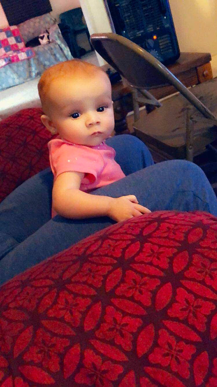 Sa'Niyah joined the competition — help win amazing prizes! baby, cheek, child, eye, furniture, person, sitting, skin, textile, toddler