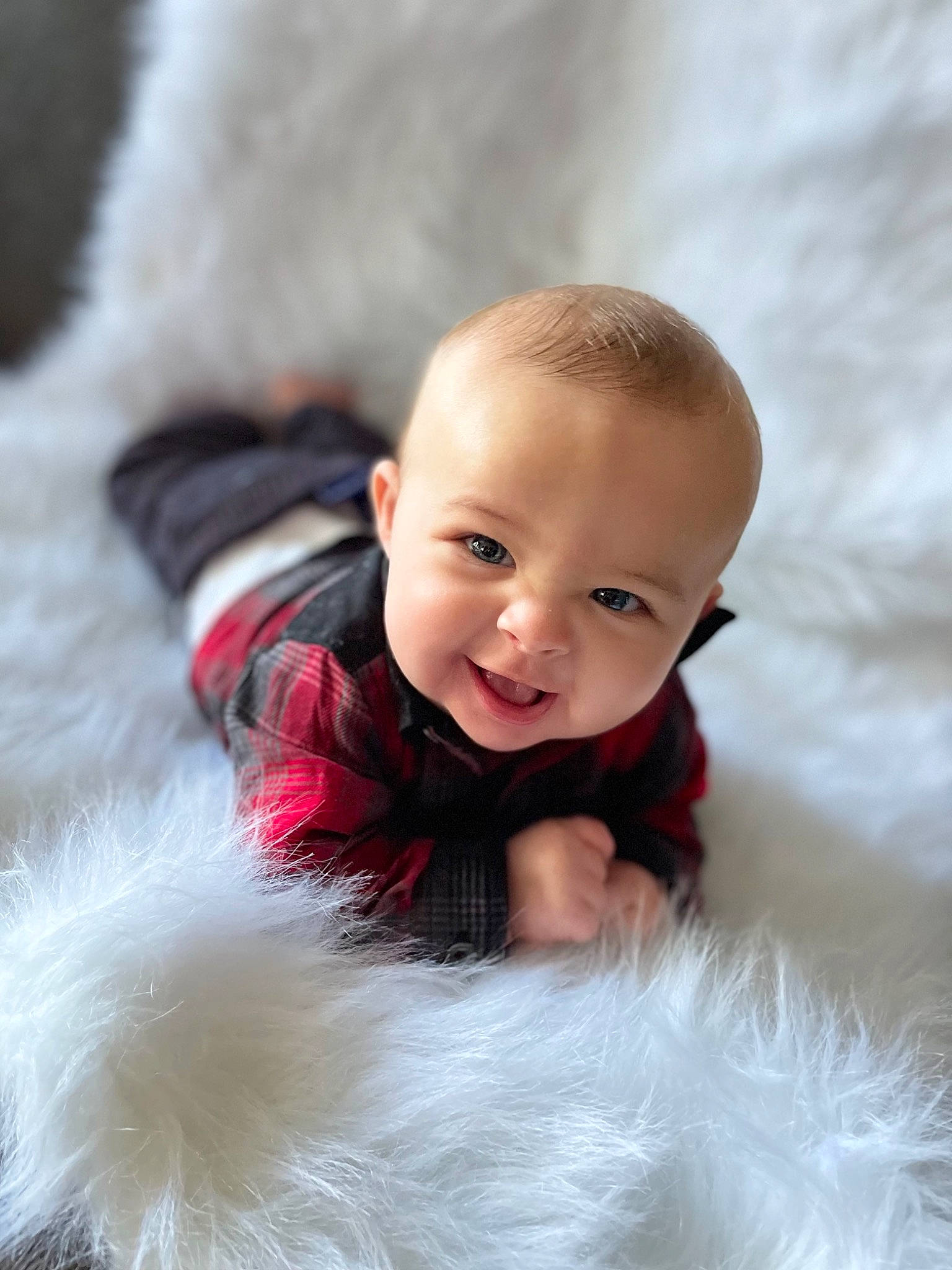 Layton joined the competition — help win amazing prizes! baby, baby_toddler_clothing, child, eye, facial_expression, flash_photography, flooring, fur, grass, hair, happy, iris, person, sitting, skin, sleeve, smile, textile, toddler, white