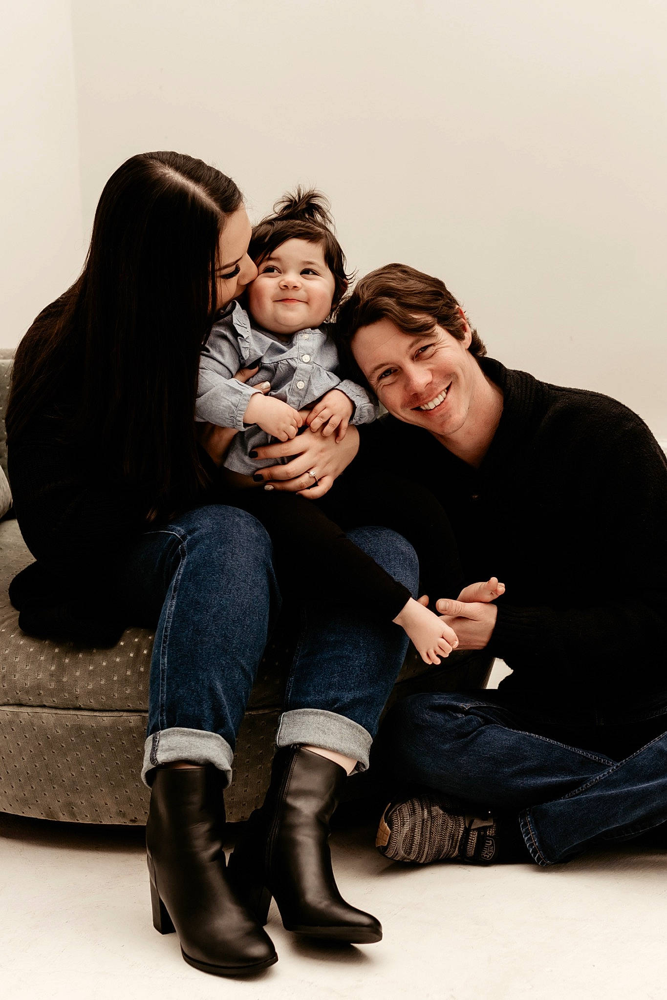 Harlie joined the competition — help win amazing prizes! blond, boot, comfort, couch, event, facial_expression, flash_photography, foot, fun, gesture, happy, human_body, human_leg, interaction, jeans, joy, knee, leg, person, sitting