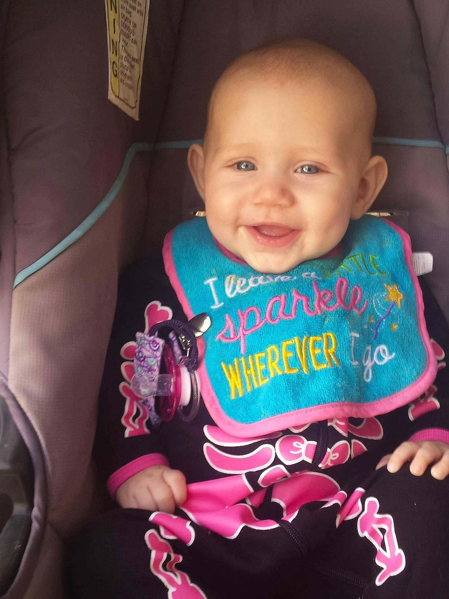 Sophia Grace is registered to the contest to win money with this photo: baby, baby_products, baby_toddler_clothing, car_seat, cheek, child, cool, face, fun, happy, head, mouth, person, pink, product, sitting, skin, smile, t_shirt, toddler