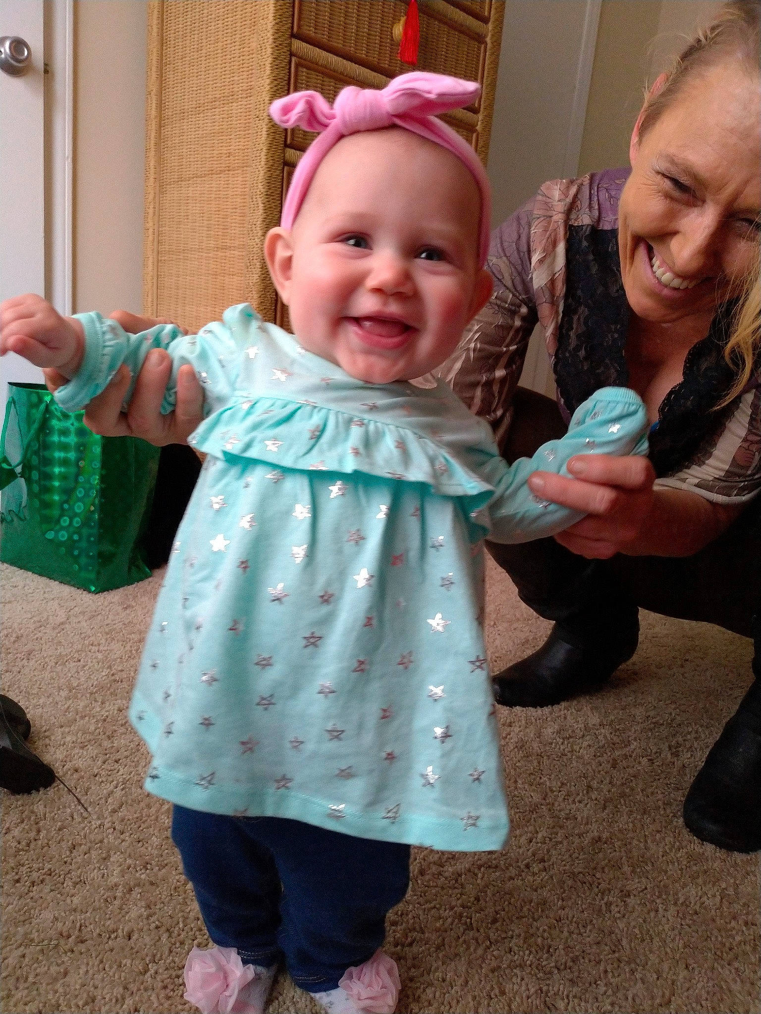 Sophia Grace is registered to the contest to win money with this photo: baby, child, costume, daughter, design, dress, ear, green, head, joy, pattern, person, pink, play, polka_dot, skin, smile, toddler