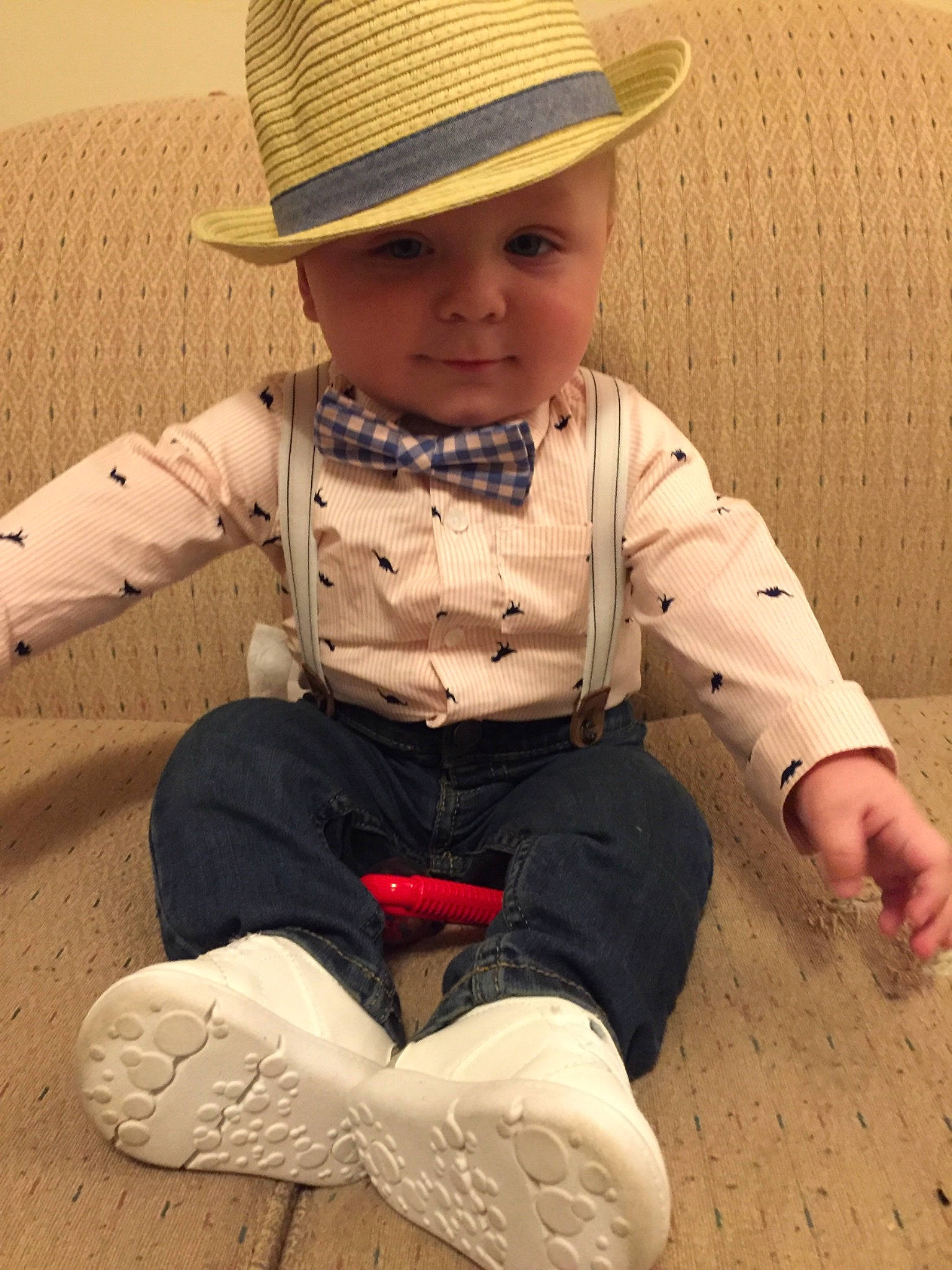 Wyatt is registered to the contest to win money with this photo: child, cowboy_hat, fashion_accessory, hat, headgear, headwear, person, sitting, sleeve, sun_hat, toddler