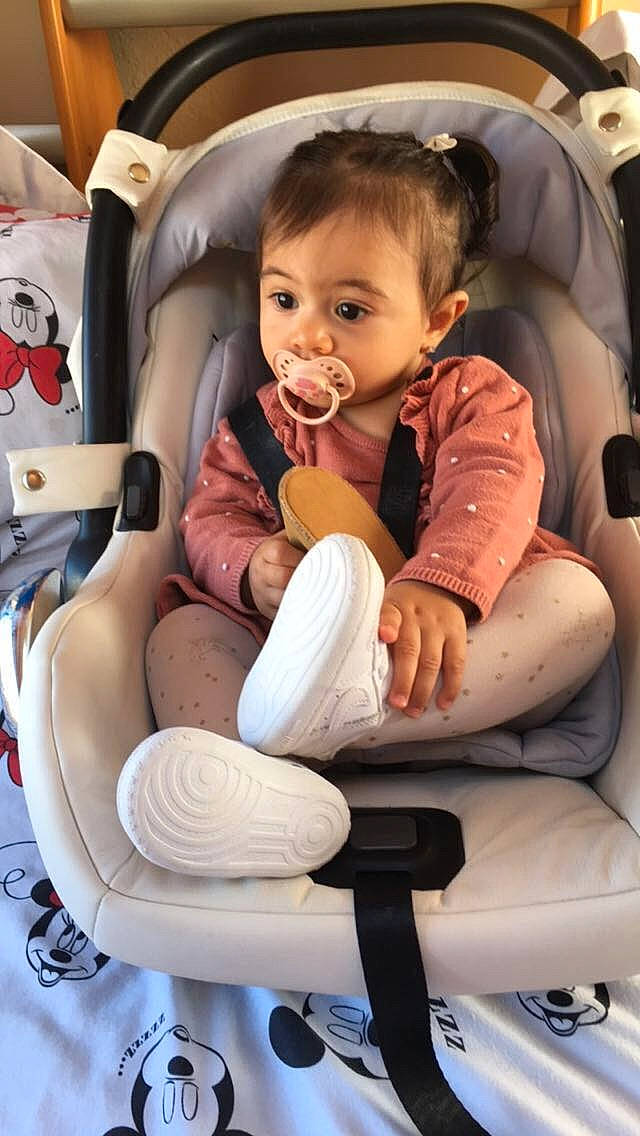 Talyana participe au concours pour gagner de l'argent avec cette photo : arm, auto_part, automotive_design, baby, baby_carriage, baby_in_car_seat, baby_products, baby_toddler_clothing, car_seat, chair, cheek, child, comfort, face, family_car, fun, hairstyle, lap, person, sitting