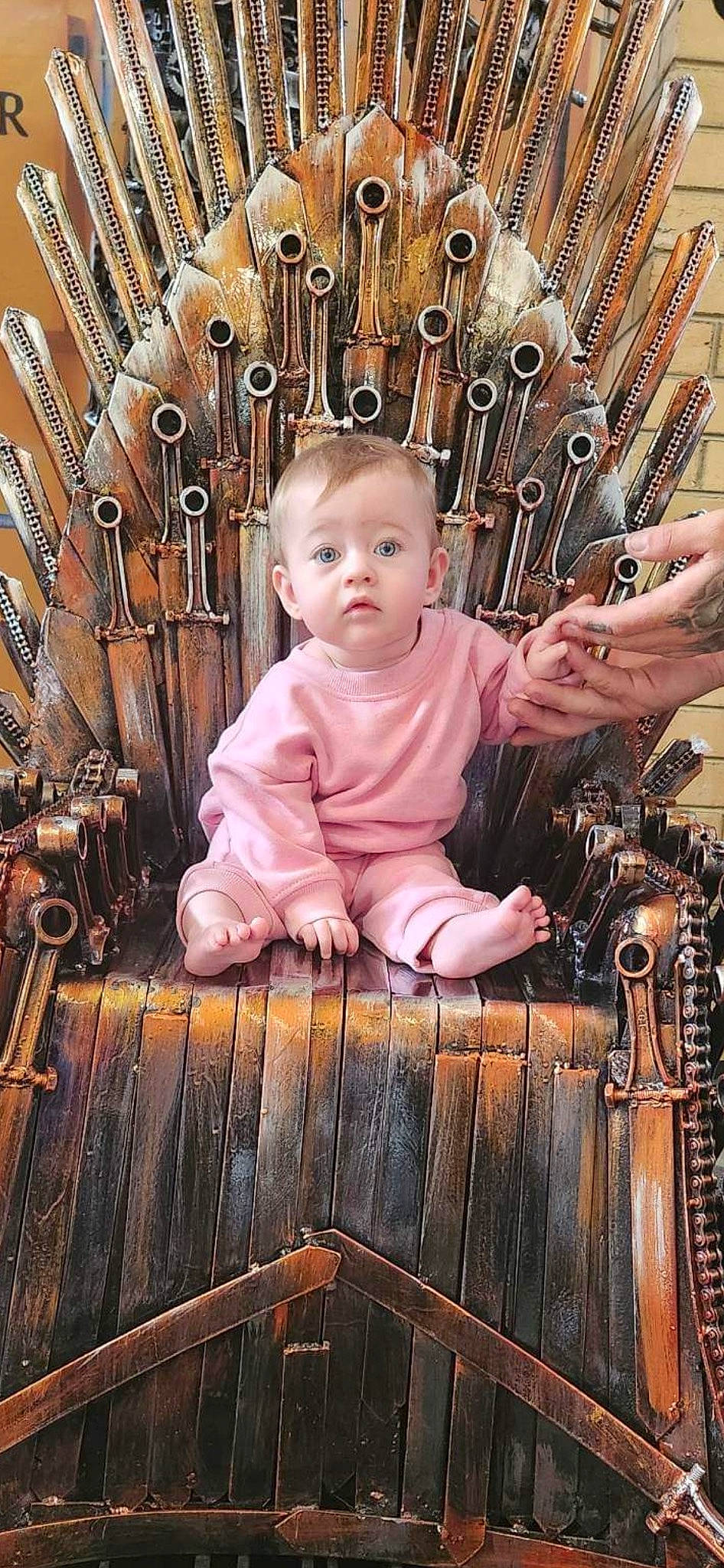 Aurora is registered to the contest to win money with this photo: baby, baby_products, baby_toddler_clothing, chair, cheek, child, dress, eye, fun, happy, hardwood, metal, organ, outerwear, pattern, person, pink, sitting, skin, toddler