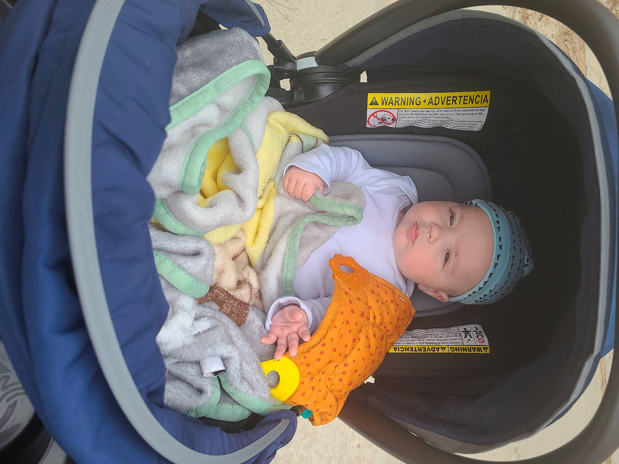 Cole joined the competition — help win amazing prizes! auto_part, baby, baby_carriage, baby_products, baby_safety, baby_toddler_clothing, baby_toys, car_seat, child, comfort, headwear, infant_bed, lap, person, sitting, sleep, toddler