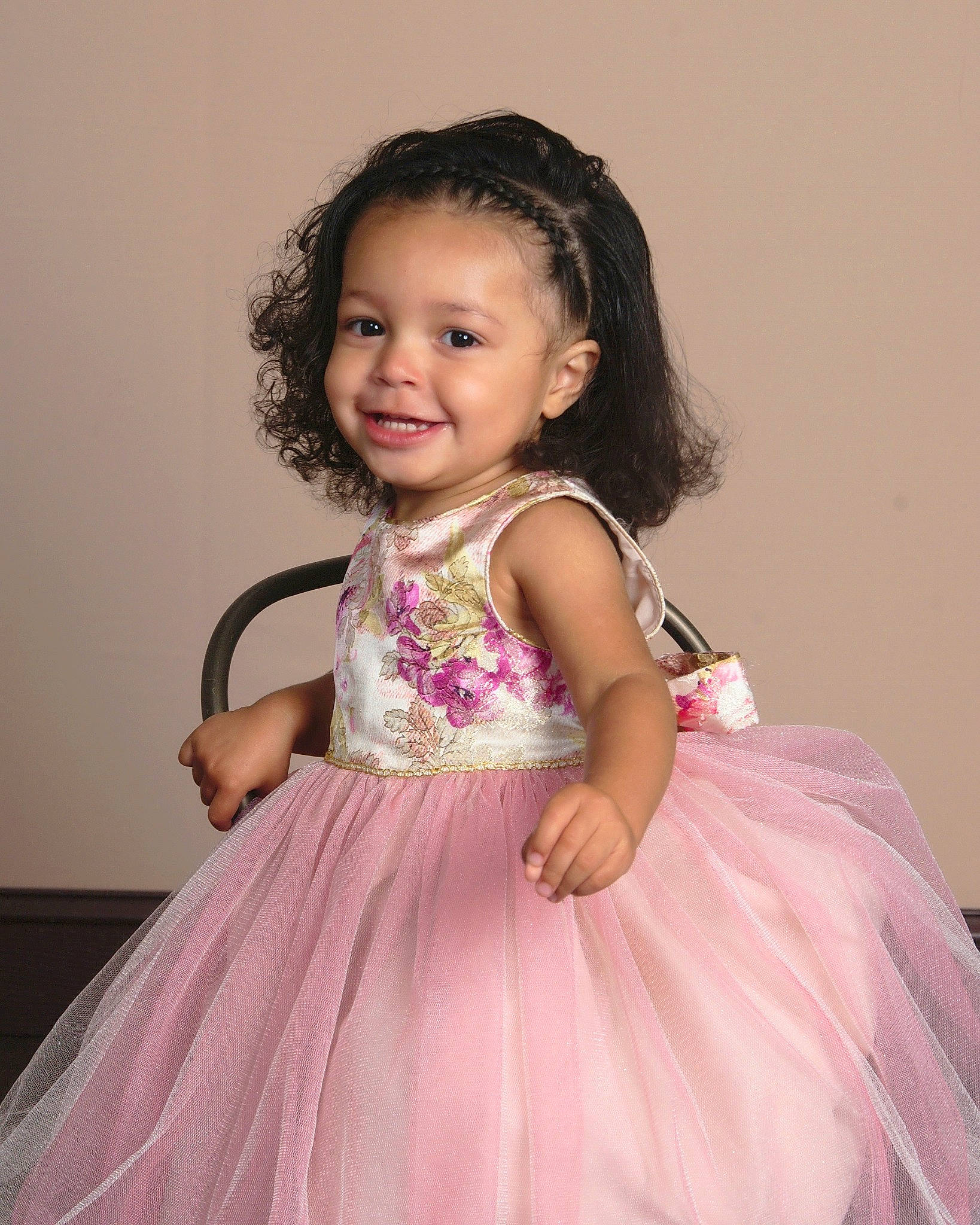 Jaelynn is registered to the contest to win money with this photo: bridal_party_dress, child, child_model, clothing, costume, dress, formal_wear, gown, joy, person, pink, smile, toddler