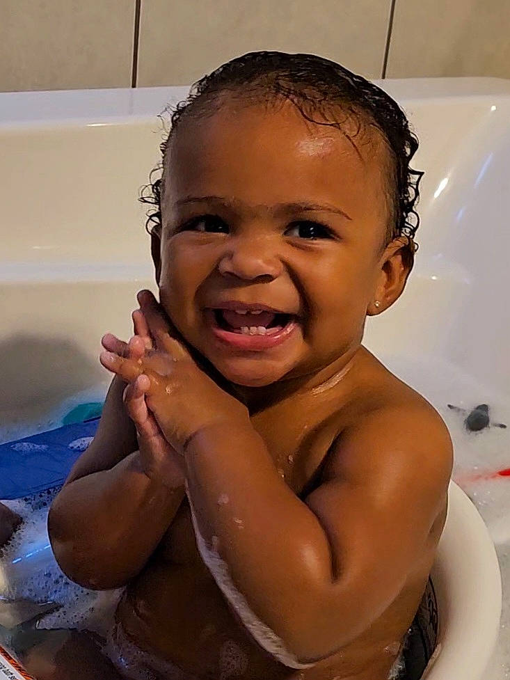 Julianna joined the competition — help win amazing prizes! baby_bathing, bathing, cheek, chin, eyebrow, face, facial_expression, forehead, gesture, hair, hairstyle, happy, head, joy, lip, mouth, neck, nose, person, skin