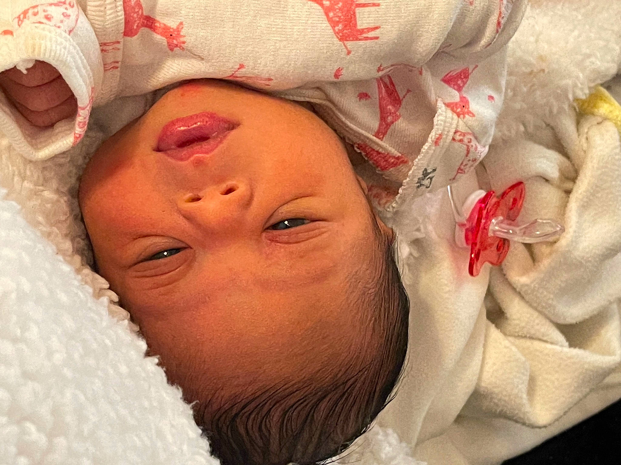 Amoura is registered to the contest to win money with this photo: baby, baby_sleeping, chin, comfort, eye, eyebrow, eyelash, face, finger, hand, happy, head, headgear, lip, mouth, nose, person, pink, product, skin