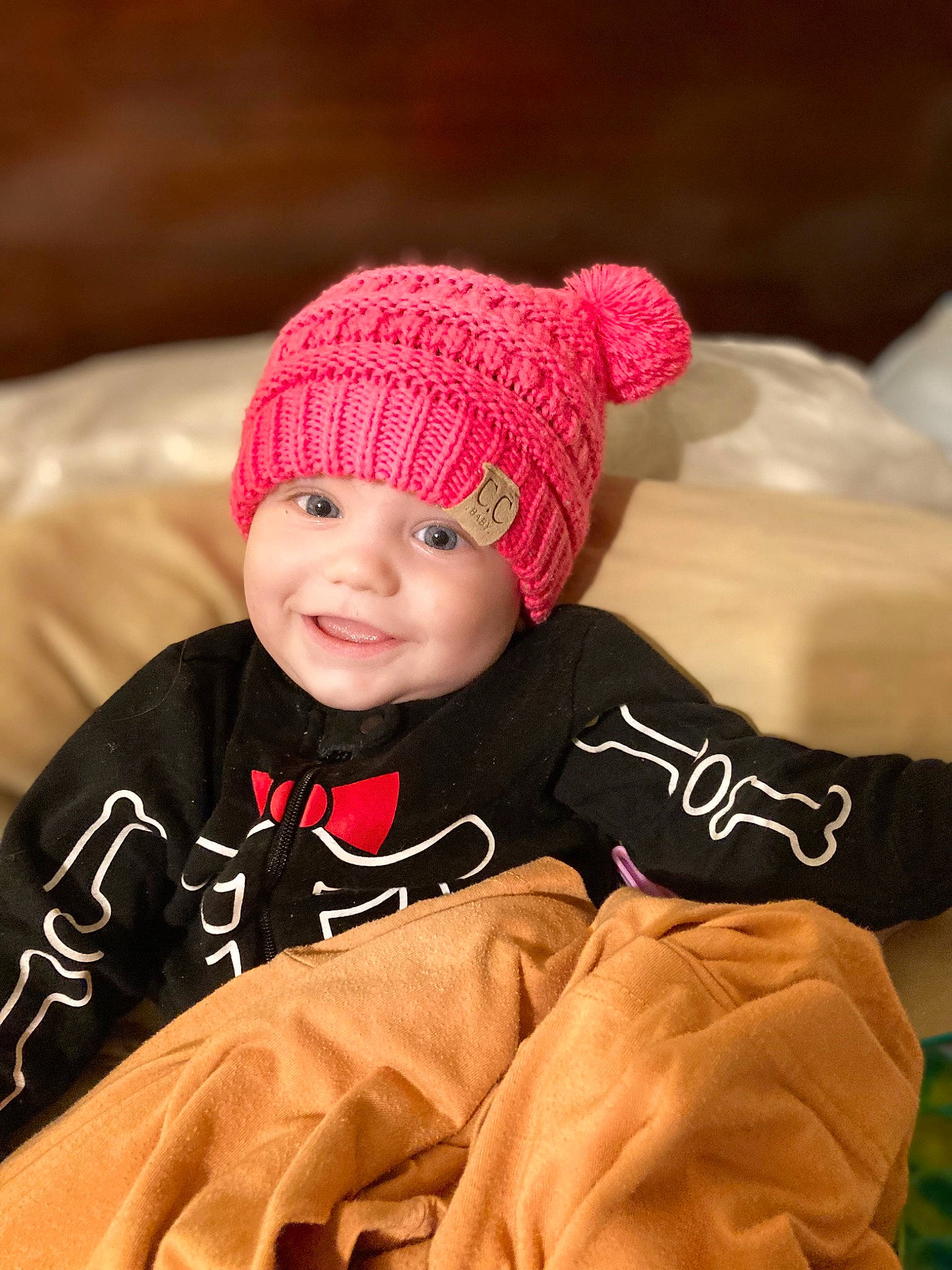 Jr is registered to the contest to win money with this photo: baby, beanie, cap, clothing, cool, facial_expression, fashion_accessory, fun, happy, hat, head, headgear, headwear, joy, knit_cap, peach, person, sleeve, smile, textile