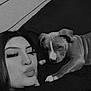 Cabo is registered to the contest to win money with this photo: woman, puppy, dog, black_and_white, selfie, bed, blanket, face, eyelashes, portrait, lying_down, pet, cute, indoor, relaxing, closeup, companion, casual, resting, animal
