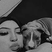 Cabo joined the competition — help win amazing prizes! black_and_white, person, puppy, dog, face, cuddle, close_up, indoors, hand, resting, eyelashes, napping, comfort, affection, pet, snuggle, portrait, animal, sleepy, cozy