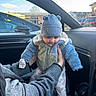 Maher joined the competition — help win amazing prizes! alloywheel, baby, beanie, cap, car, carwheel, clothing, face, glove, hat, head, knitwear, machine, person, spoke, sweater, tire, transportation, vehicle, wheel