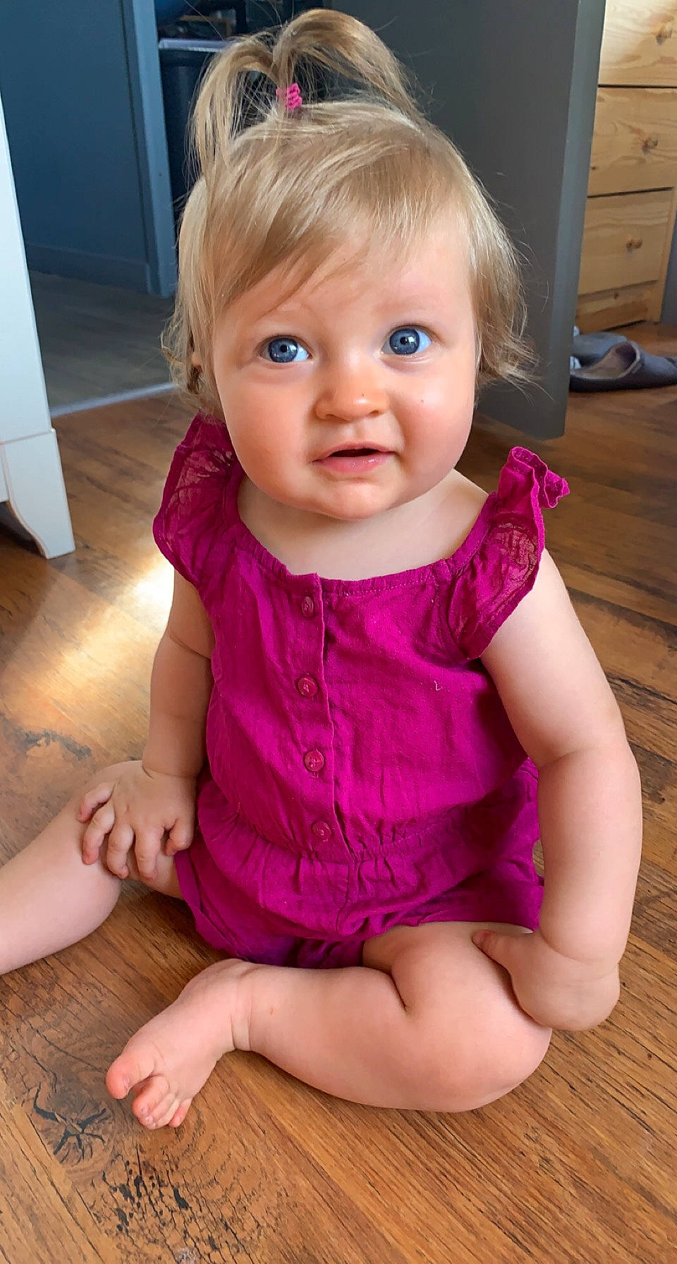 Anaé participe au concours pour gagner de l'argent avec cette photo : baby_toddler_clothing, cabinetry, cheek, chin, dress, eye, eyelash, face, finger, hair, iris, joint, lip, person, pink, purple, shoulder, skin, sleeve, standing