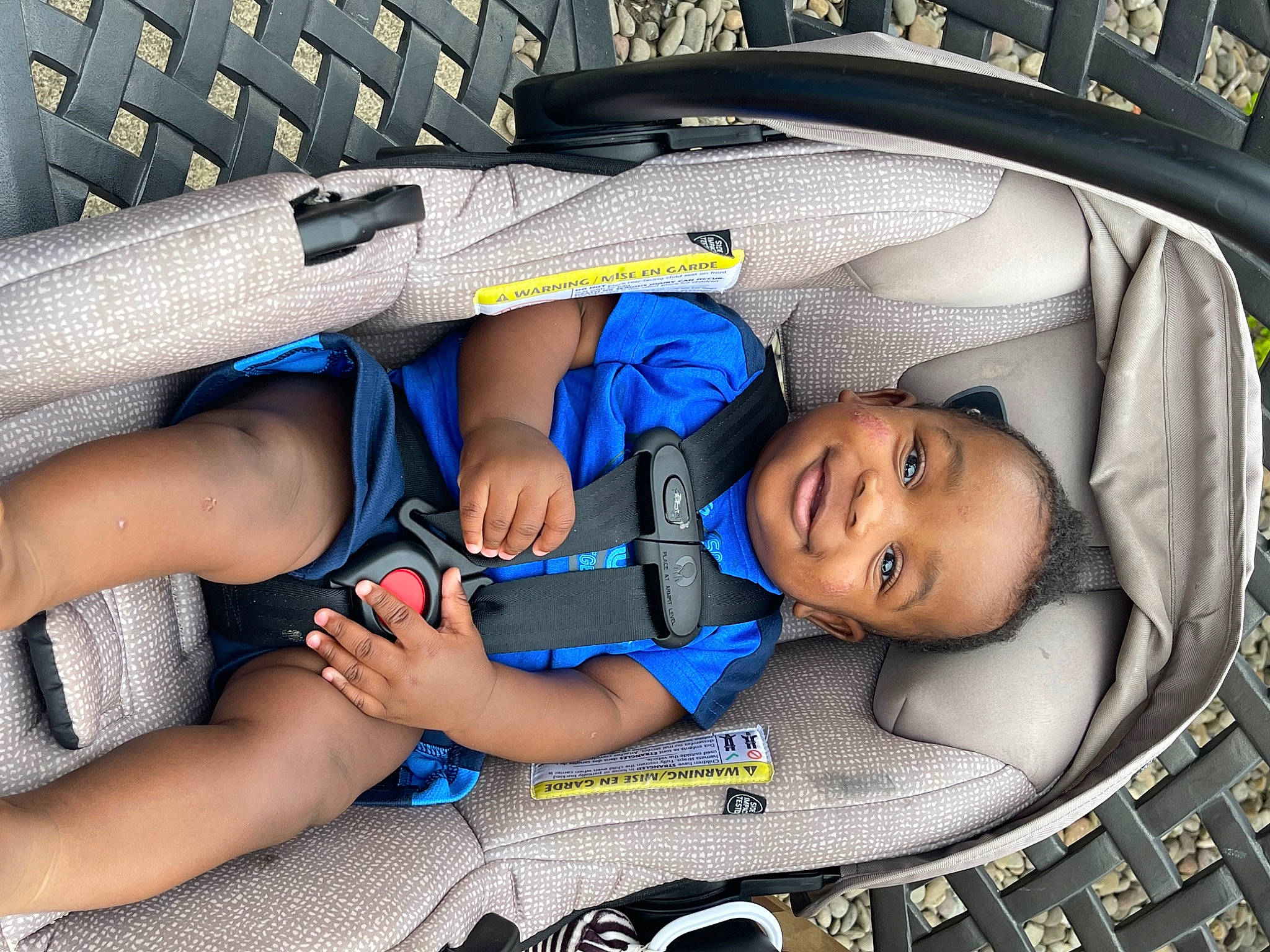 Koji is registered to the contest to win money with this photo: baby, baby_carriage, baby_products, baby_toddler_clothing, car_seat, child, comfort, electric_blue, fun, happy, human_leg, joy, mouth, organ, pattern, person, product, smile, snapshot, thigh