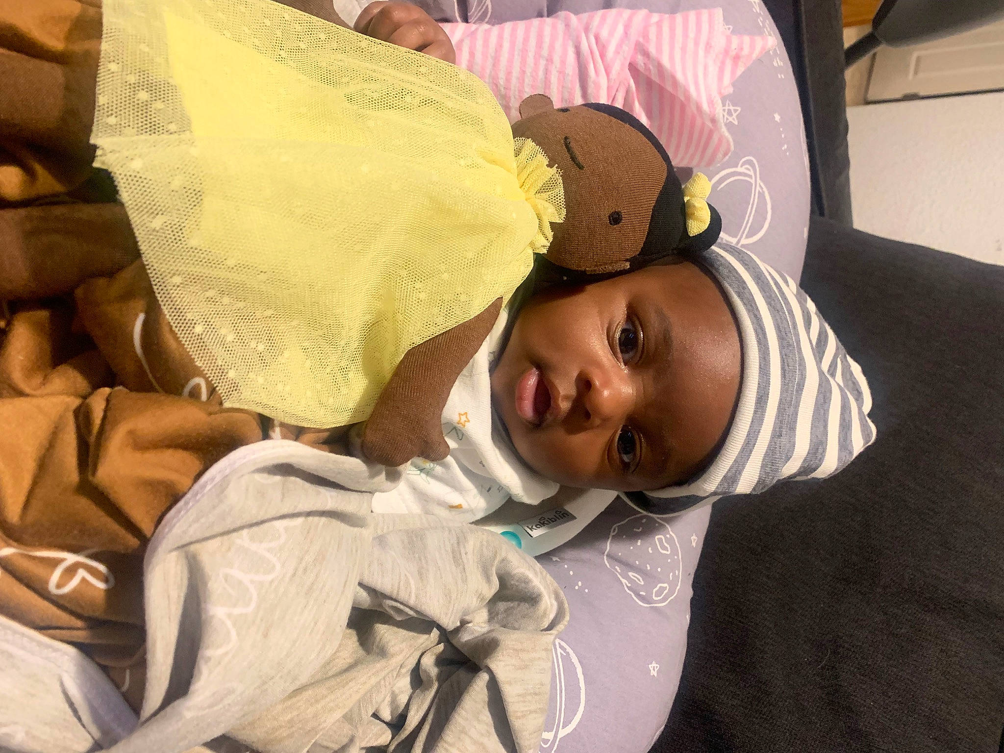 Lacey is registered to the contest to win money with this photo: baby, baby_products, car_seat, cheek, child, comfort, fun, happy, hat, linens, nap, person, room, sleep, toddler