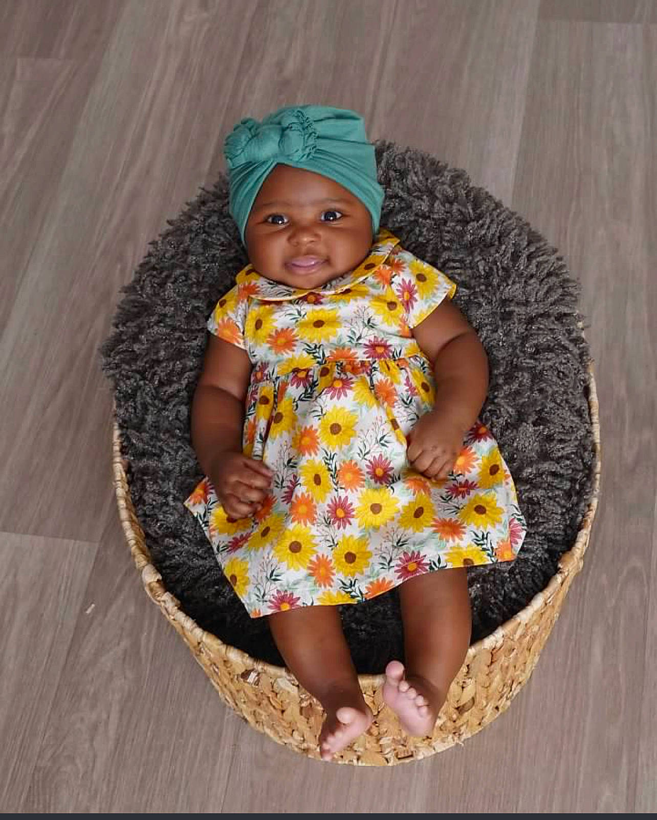 Lacey is registered to the contest to win money with this photo: baby, baby_toddler_clothing, cap, chair, child, circle, comfort, dress, fashion_accessory, fun, happy, hat, headwear, human_leg, linens, magenta, pattern, person, sitting, sleeve