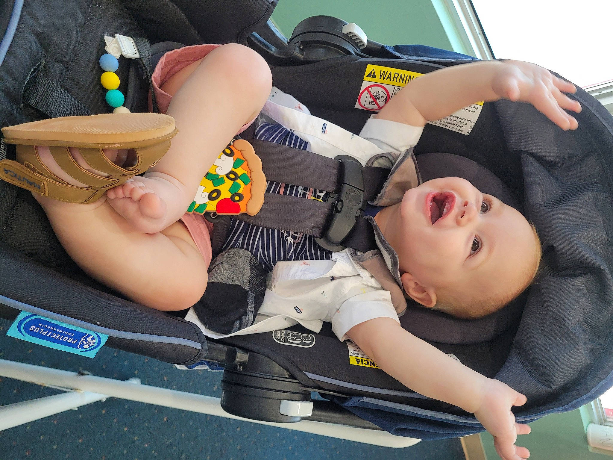 Jackson Thomas is registered to the contest to win money with this photo: auto_part, automotive_design, automotive_exterior, baby_carriage, bumper, car_seat, fun, leisure, motor_vehicle, people, person, product, recreation, shorts, sneakers, thigh, tire, toddler, vehicle, vehicle_door