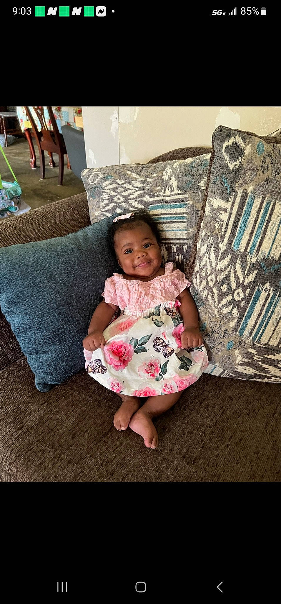 Jewel joined the competition — help win amazing prizes! baby, baby_toddler_clothing, child, comfort, couch, dress, eye, face, flash_photography, floor, flooring, fun, happy, joy, leisure, linens, magenta, person, smile, textile