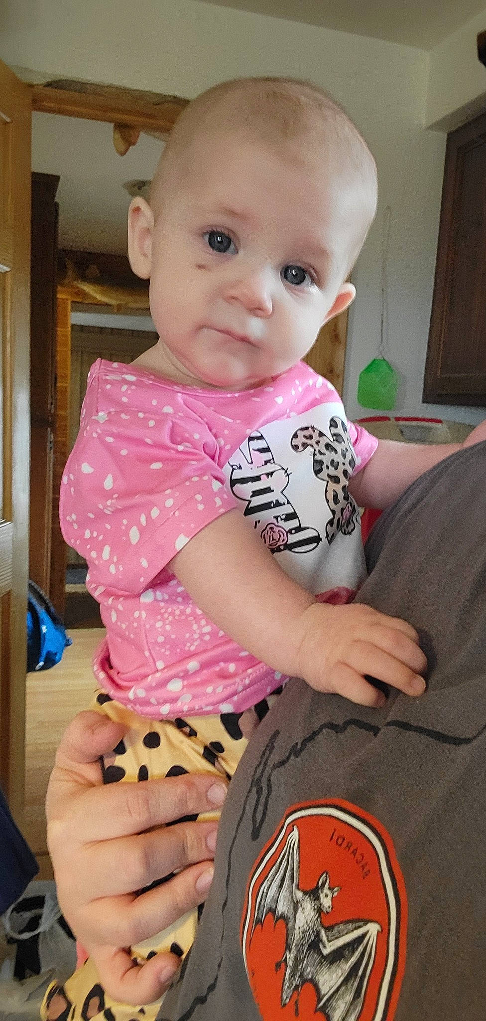 Lucille joined the competition — help win amazing prizes! baby, baby_toddler_clothing, cheek, eye, eyebrow, eyelash, finger, guitar_accessory, hand, human_body, iris, lip, neck, nose, person, pink, product, skin, sleeve, standing