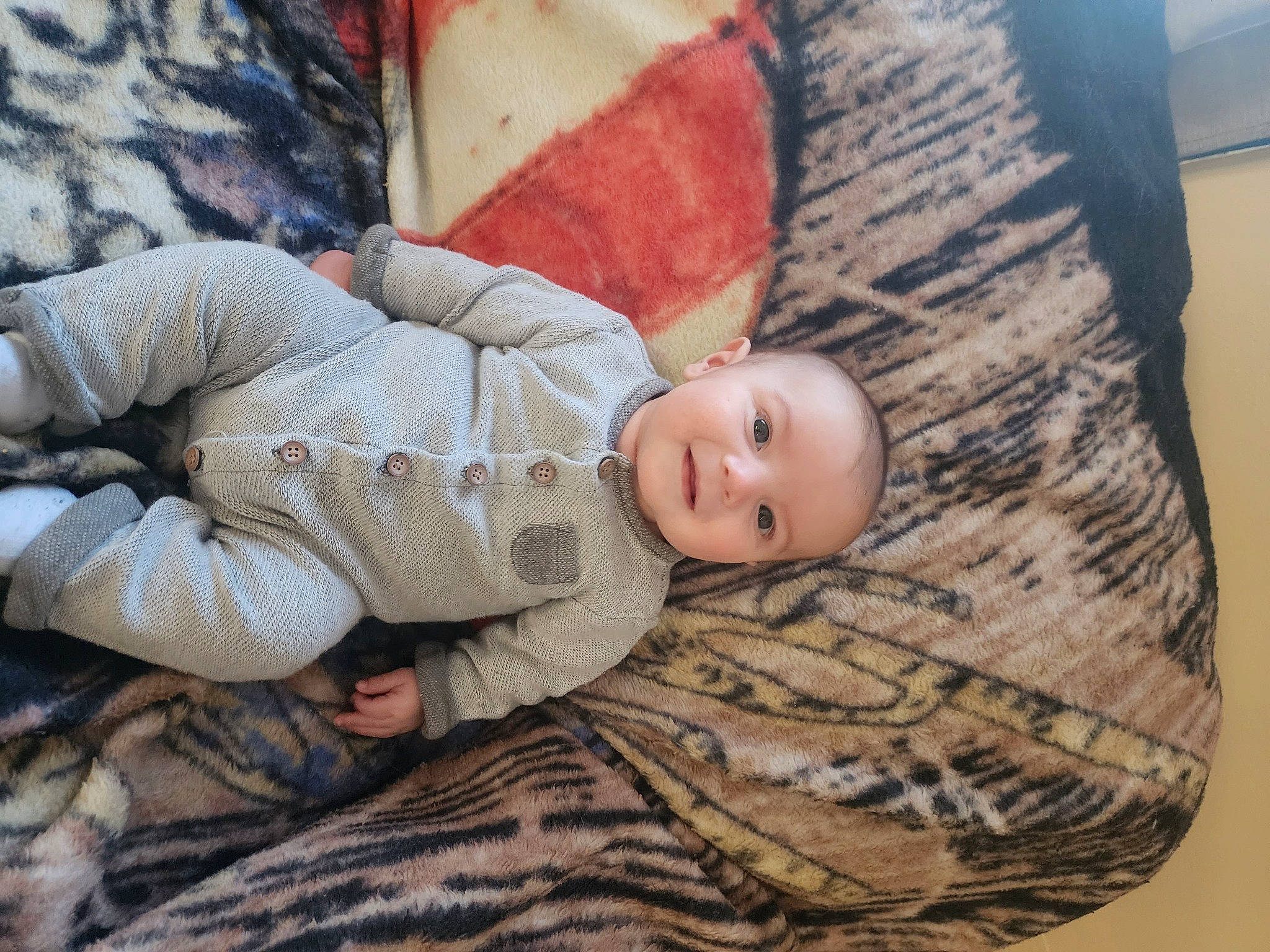 Dennis joined the competition — help win amazing prizes! baby, baby_products, baby_toddler_clothing, bedding, cheek, child, comfort, couch, face, flooring, happy, linens, pattern, person, room, sitting, sleeve, textile, toddler, wood