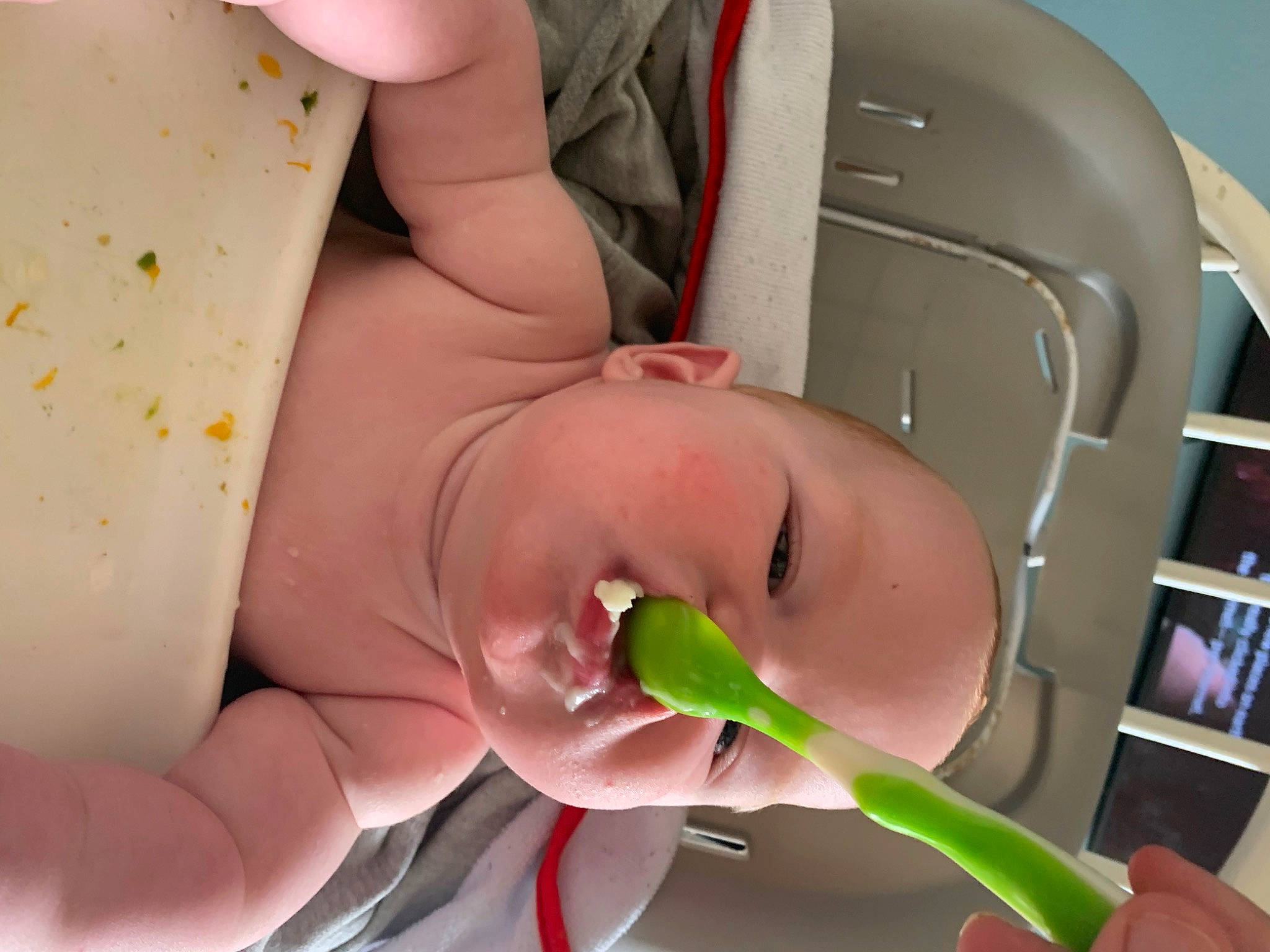 Jaxston is registered to the contest to win money with this photo: arm, baby, bookcase, chest, diaper, eyelash, finger, hand, health_care, human_body, joint, medical_equipment, mouth, nail, neck, nose, person, shelf, skin, thumb