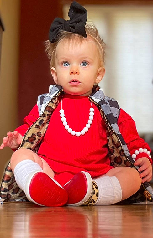 Jocelyn is registered to the contest to win money with this photo: baby, baby_toddler_clothing, child, dress, entertainment, event, fashion_accessory, fashion_design, flooring, fun, human_leg, jewellery, neck, performing_arts, person, pink, red, skin, sleeve, surprise