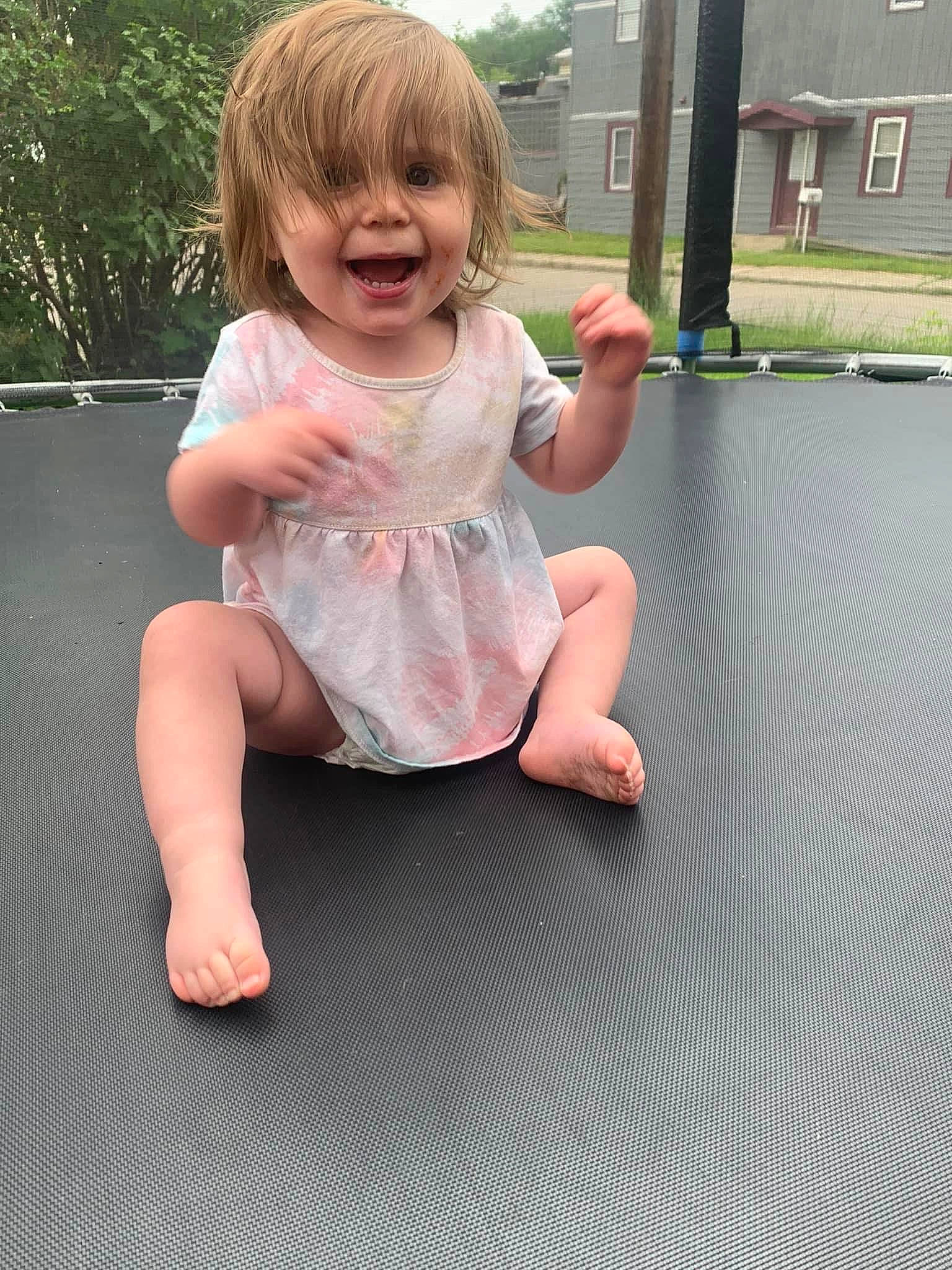 Brooklynn joined the competition — help win amazing prizes! baby_toddler_clothing, barefoot, child, facial_expression, fun, grass, hair, happy, joint, joy, knee, leg, leisure, people_in_nature, person, pink, recreation, shoulder, skin, smile