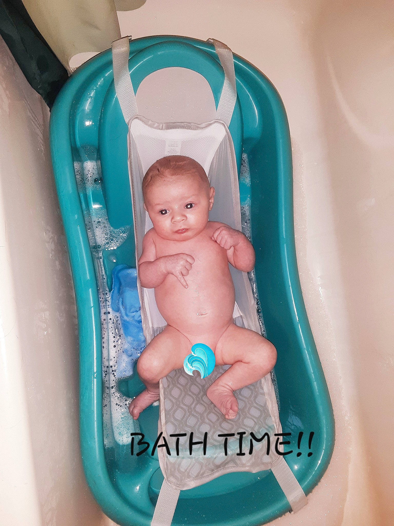 Xayden is registered to the contest to win money with this photo: aqua, baby, baby_bathing, baby_products, bathing, bathtub, child, person, plumbing_fixture, product, turquoise