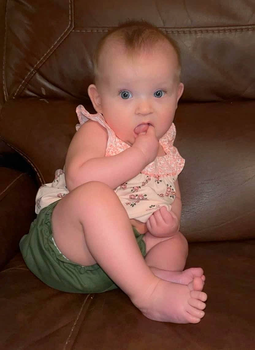 Kynslee is registered to the contest to win money with this photo: baby, baby_toddler_clothing, cheek, chest, comfort, couch, finger, flash_photography, human_body, iris, joint, knee, leg, nail, person, skin, stomach, surprise, thigh, thumb
