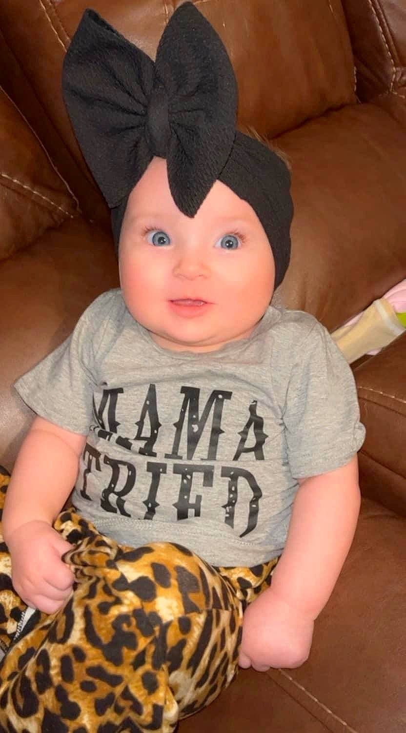 Kynslee is registered to the contest to win money with this photo: baby, baby_toddler_clothing, cap, cheek, comfort, eye, facial_expression, hairstyle, happy, head, headwear, human_body, neck, nose, organ, person, skin, sleeve, smile, textile