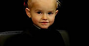 Khaleecy is registered to the contest to win money with this photo: black_background, blonde_hair, child, cute, earrings, expression, eyebrows, face, fashion, headband, headshot, innocent, looking_at_camera, person, portrait, sitting, smile, studio, toddler, young
