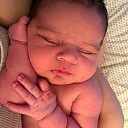 Ezekiel is registered to the contest to win money with this photo: baby, newborn, sleeping, infant, skin, hand, arm, face, closed_eyes, peaceful, cute, soft_light, portrait, closeup, human, newborn_baby, resting, fingers, sleep, toddler