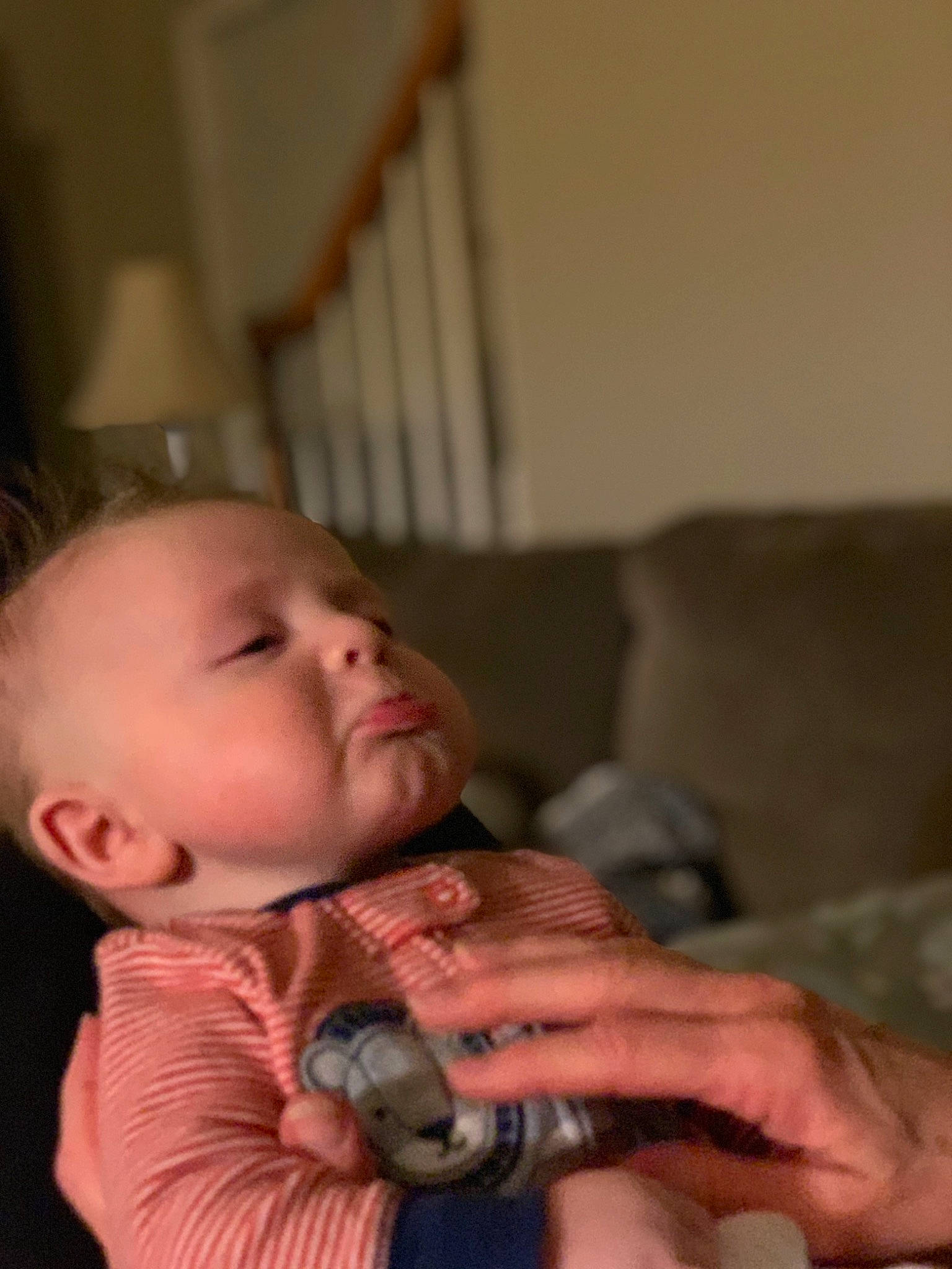 Baker is registered to the contest to win money with this photo: baby, baby_products, baby_toddler_clothing, cheek, child, comfort, couch, finger, human, nail, person, skin, thumb, toddler