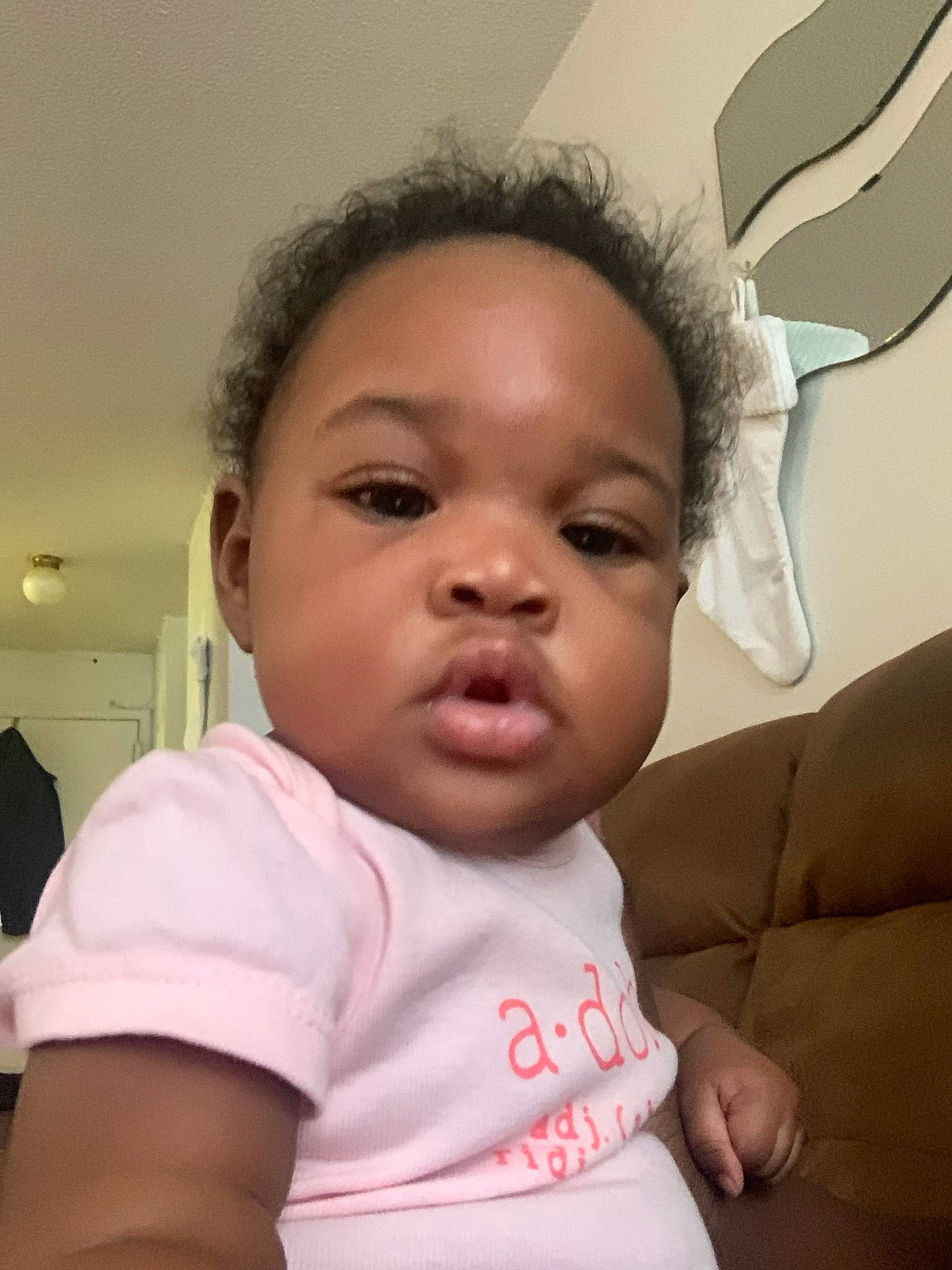 Malani is registered to the contest to win money with this photo: baby, cheek, comfort, ear, eyebrow, eyelash, forehead, gesture, hairstyle, happy, head, iris, jaw, lip, mouth, nose, person, skin, sleeve, thumb