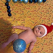 Zayone participe au concours pour gagner de l'argent avec cette photo : baby, infant, santa_hat, christmas_ornaments, blue_balls, black_balls, holiday, festive, candy_cane_pattern, background, lying_down, naked, cute, holiday_decor, celebration, christmas, toy, festive_background, child, holiday_spirit