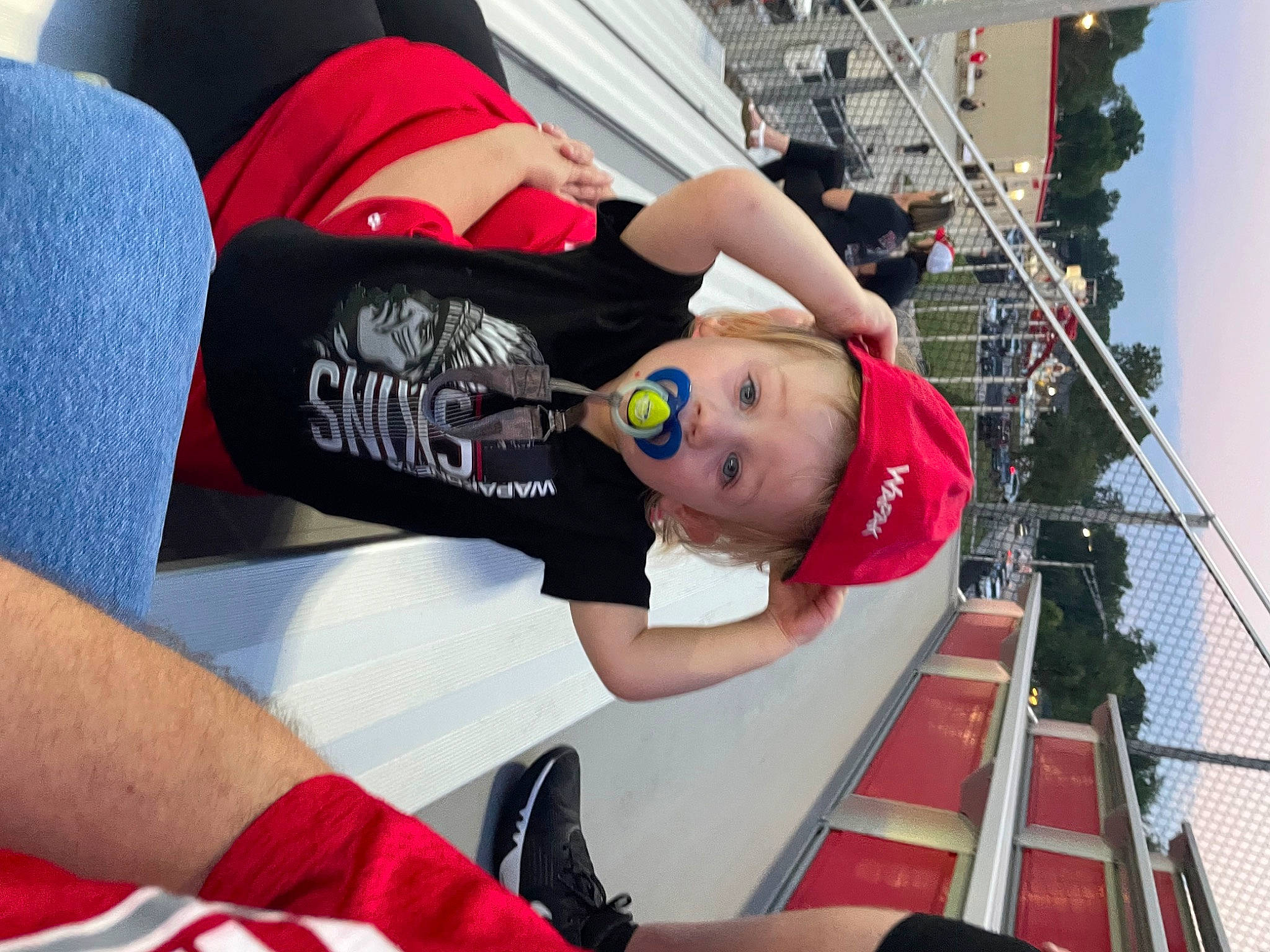 Paul joined the competition — help win amazing prizes! arm, child, elbow, eyewear, fun, hat, human_leg, knee, leisure, person, recreation, red, sitting, sky, sleeve, t_shirt, thigh, wrist