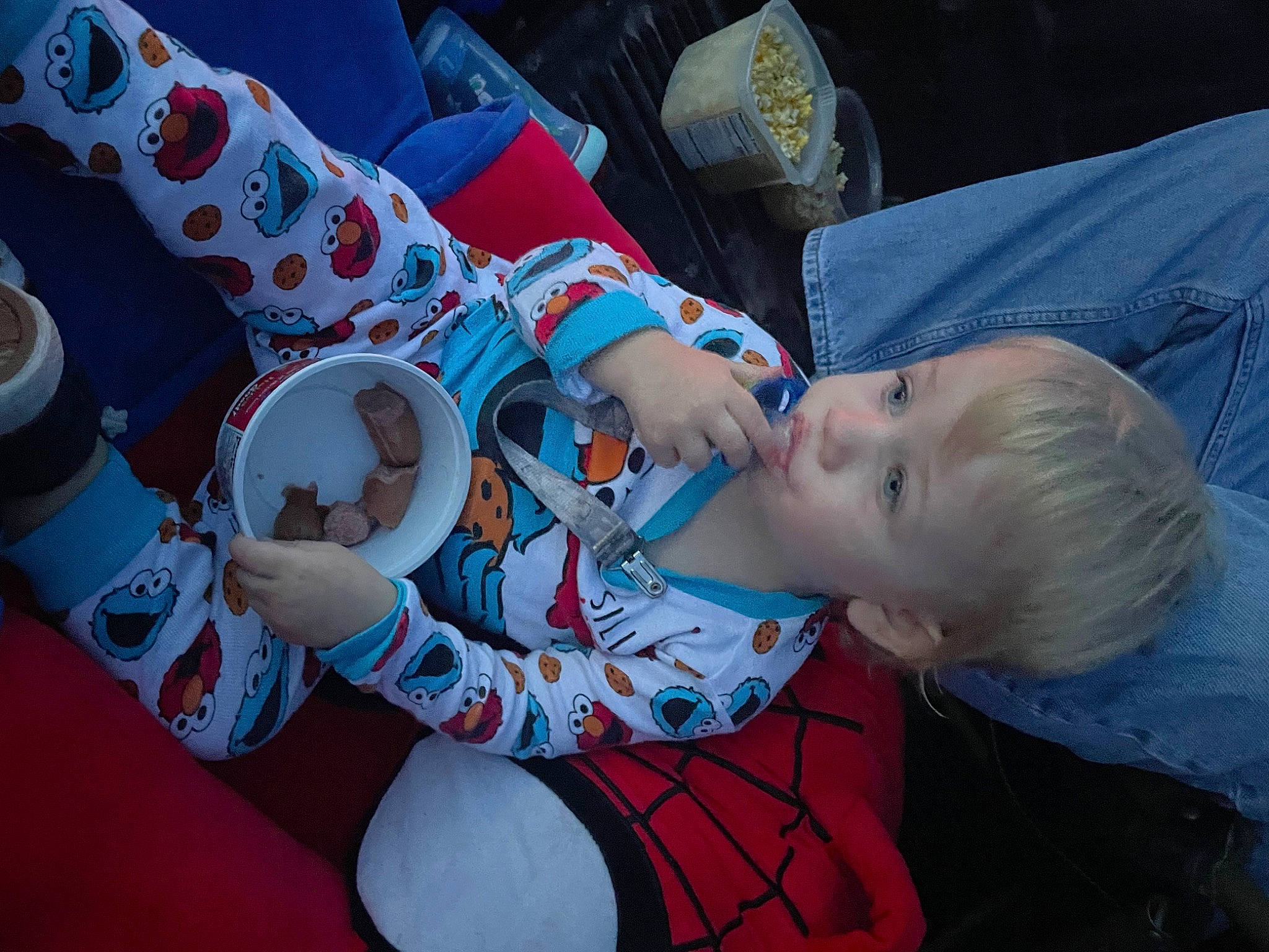 Paul is registered to the contest to win money with this photo: baby, baby_toddler_clothing, carmine, child, drinkware, event, fun, lap, pattern, person, sitting, tableware, toddler