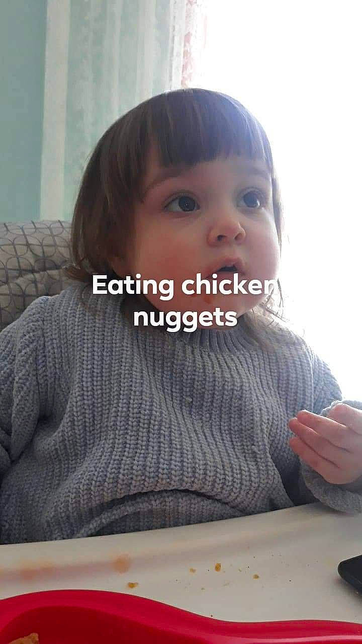 Lilianna is registered to the contest to win money with this photo: arm, cheek, chin, eyebrow, eyelash, finger, forehead, happy, iris, lip, mouth, neck, nose, outerwear, person, skin, sleeve, t_shirt, table, tableware