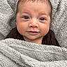 Liam joined the competition — help win amazing prizes! baby, blanket, infant, face, blue_eyes, wrapped, cozy, soft_texture, cute, portrait, child, newborn, warm, expression, sleepwear, closeup, head, skin, person, indoors