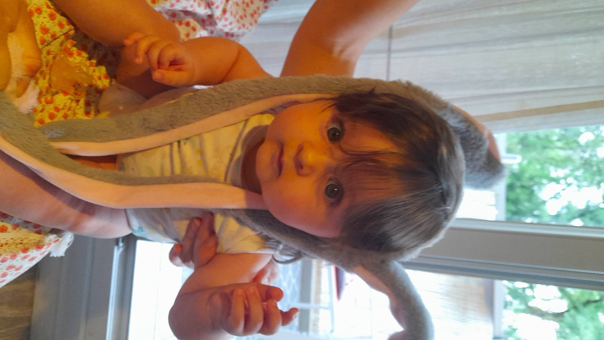 Alba participe au concours pour gagner de l'argent avec cette photo : baby, baby_toddler_clothing, chair, child, dress, ear, finger, fun, hand, happy, headpiece, leisure, nail, nose, person, room, smile, thumb, toddler, vacation