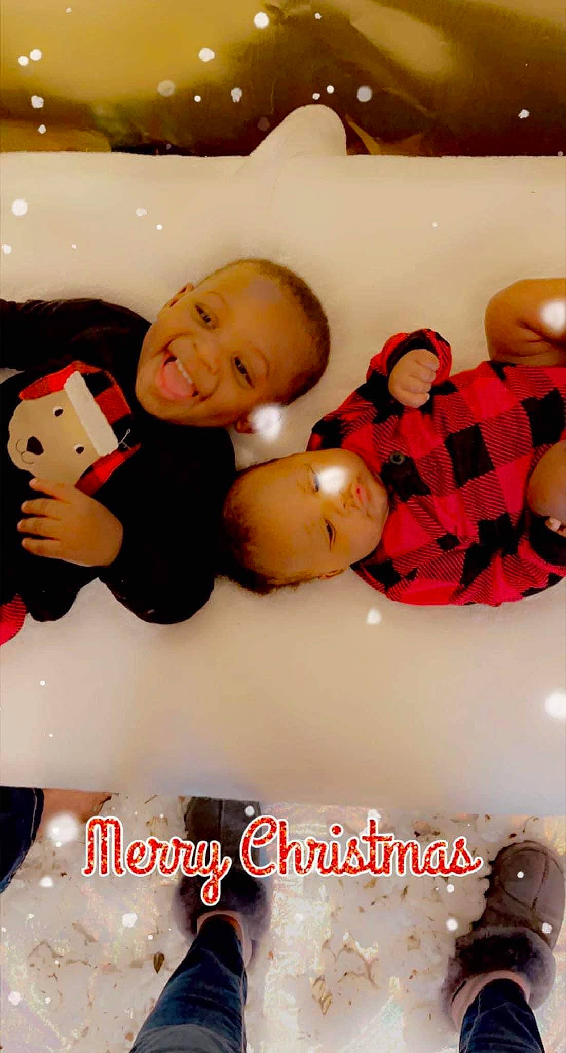 Roddre is registered to the contest to win money with this photo: abdomen, baby, carmine, child, comfort, font, fun, happy, headgear, joy, mouth, pattern, person, photo_caption, plush, sitting, smile, stuffed_toy, teddy_bear, thigh