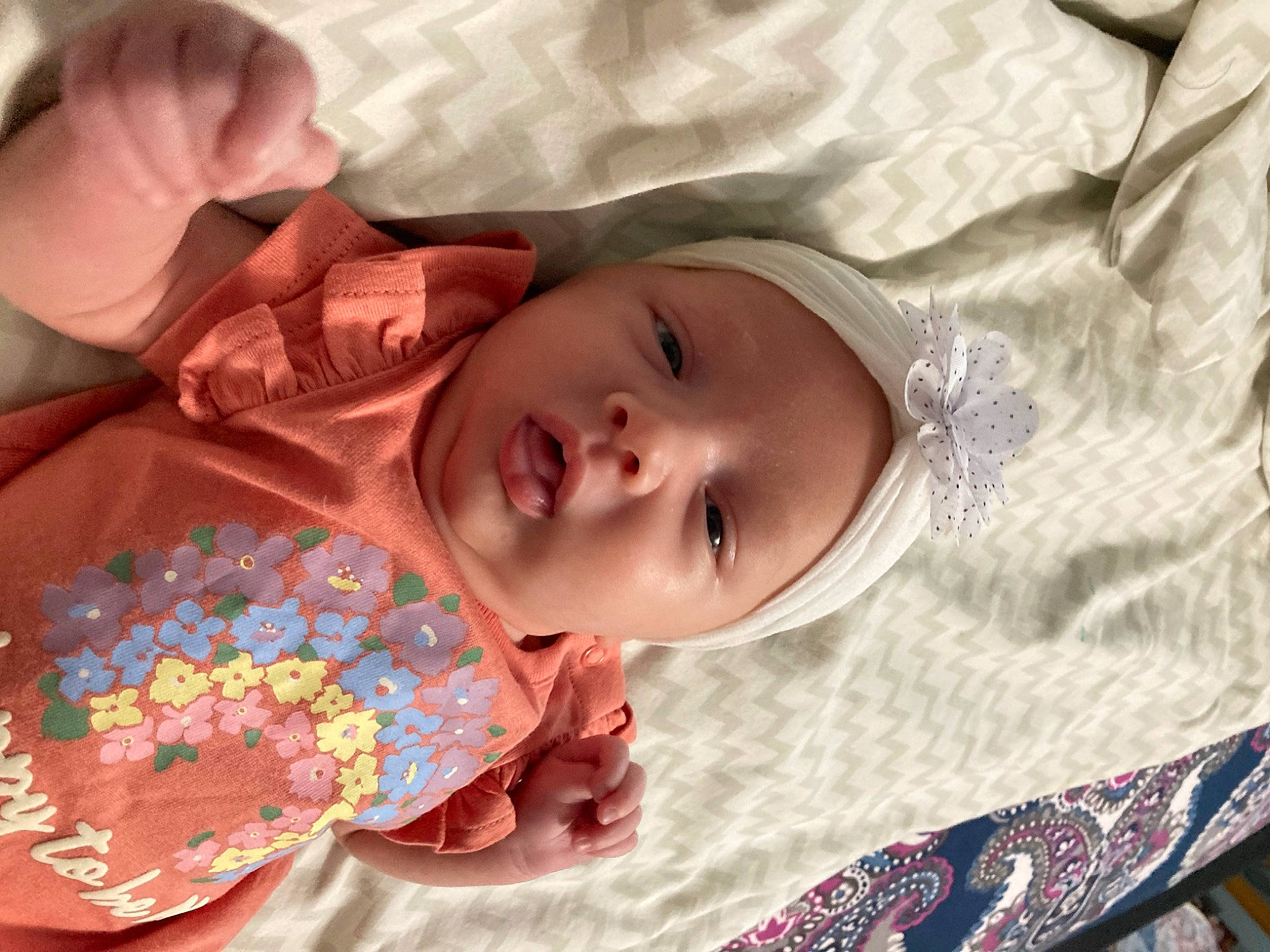 Oaklynn joined the competition — help win amazing prizes! baby, baby_toddler_clothing, cheek, child, chin, comfort, eyelash, face, facial_expression, happy, head, headwear, iris, linens, lip, mouth, nose, pattern, person, skin