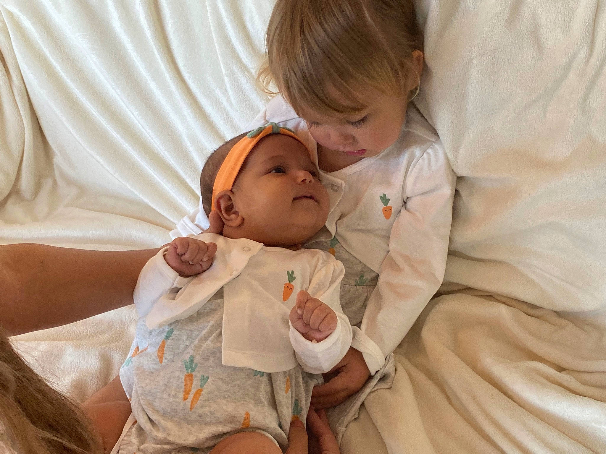 Josephina is registered to the contest to win money with this photo: baby, baby_toddler_clothing, bedding, cheek, child, comfort, event, face, gesture, happy, head, headwear, linens, love, peach, person, room, skin, smile, textile