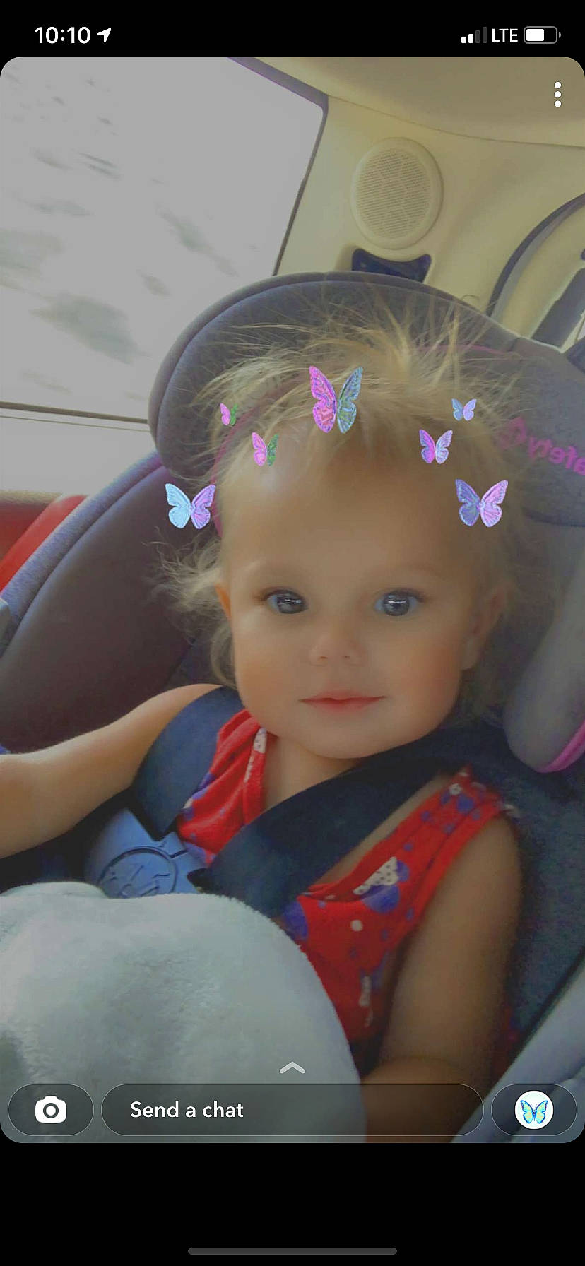 Amelia joined the competition — help win amazing prizes! auto_part, black_hair, car_seat, child, cool, electric_blue, eyebrow, eyelash, family_car, fashion_accessory, fun, hair_accessory, happy, headband, headpiece, iris, magenta, person, steering_wheel, toddler