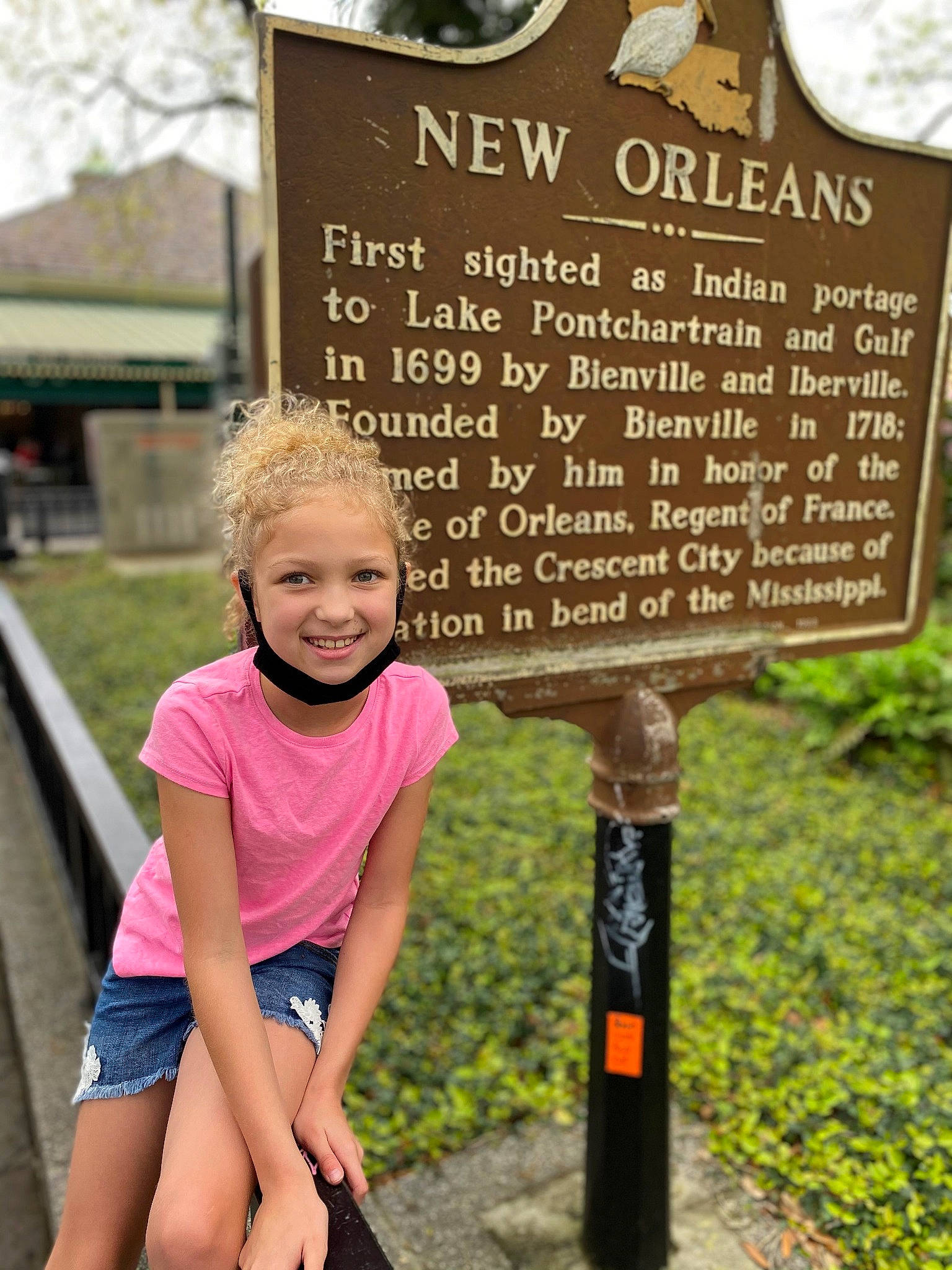 Emmeline is registered to the contest to win money with this photo: child, commemorative_plaque, font, fun, grass, happy, joy, landscape, leisure, line, magenta, natural_landscape, nature, person, plant, recreation, sign, signage, smile, spring